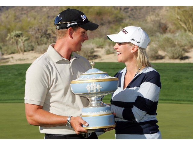 MARANA, AZ - FEBRUARY 25: Henrik Stenson of Sweden and his wife Emma Stensen share a laugh as they hold the Walter Hagen Cup after Stenson defeated Geoff Ogilvy of Australia 2 and 1 in the final Round of the WGC-Accenture Match Play Championships at the Gallery at Dove Mountain on February 25, 2007 in Marana, Arizona. (Photo by Andy Lyons/Getty Images)