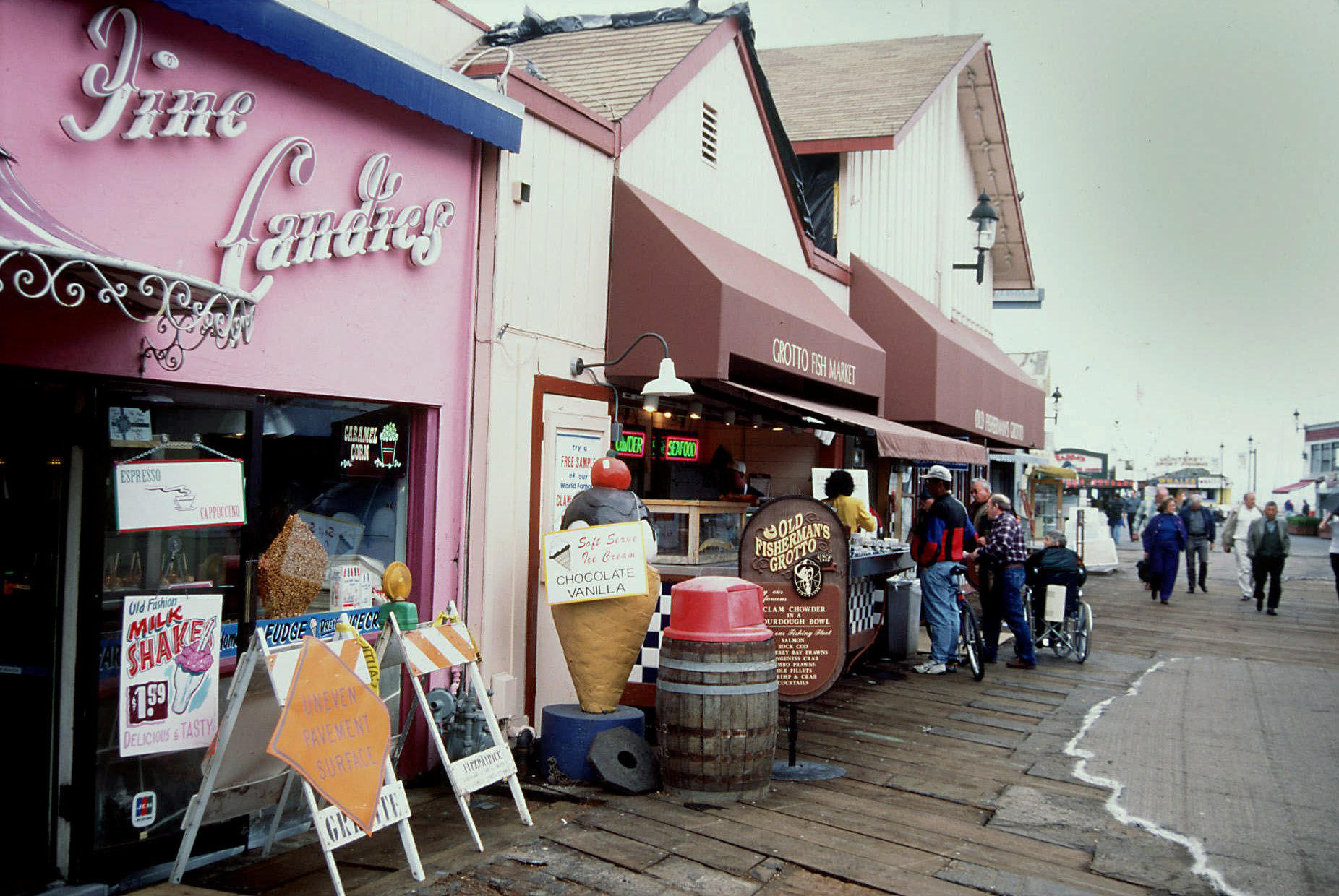 Visitors browse shops along the Fisherman's Wharf in Monterey, California, near neighboring Carmel. Carmel is a favorite attraction with visitors to the Monterey area because the small northern California coastal city is near the Monterey Peninsula and other major points of interests to tourists, including Pebble Beach, Monterey Aquarium, Big Sur and the 17-Mile Drive (1997) PHOTO CREDIT: JAY CLARKE/MIAMI HERALD