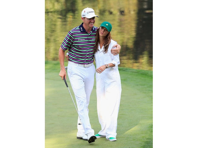 AUGUSTA, GA - APRIL 08: Jimmy Walker of the United States embraces his wife Erin during the Par 3 Contest prior to the start of the 2015 Masters Tournament at Augusta National Golf Club on April 8, 2015 in Augusta, Georgia. (Photo by Jamie Squire/Getty Images)