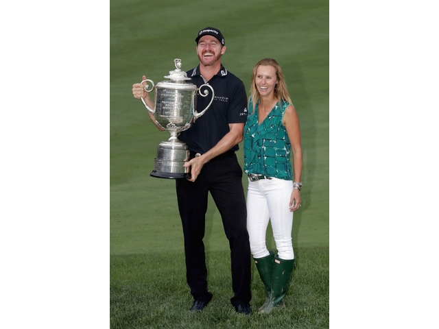 SPRINGFIELD, NJ - JULY 31: Jimmy Walker (L) of the United States celebrates with the Wanamaker Trophy alongside his wife, Erin (R), after winning the 2016 PGA Championship at Baltusrol Golf Club on July 31, 2016 in Springfield, New Jersey. (Photo by Streeter Lecka/Getty Images)